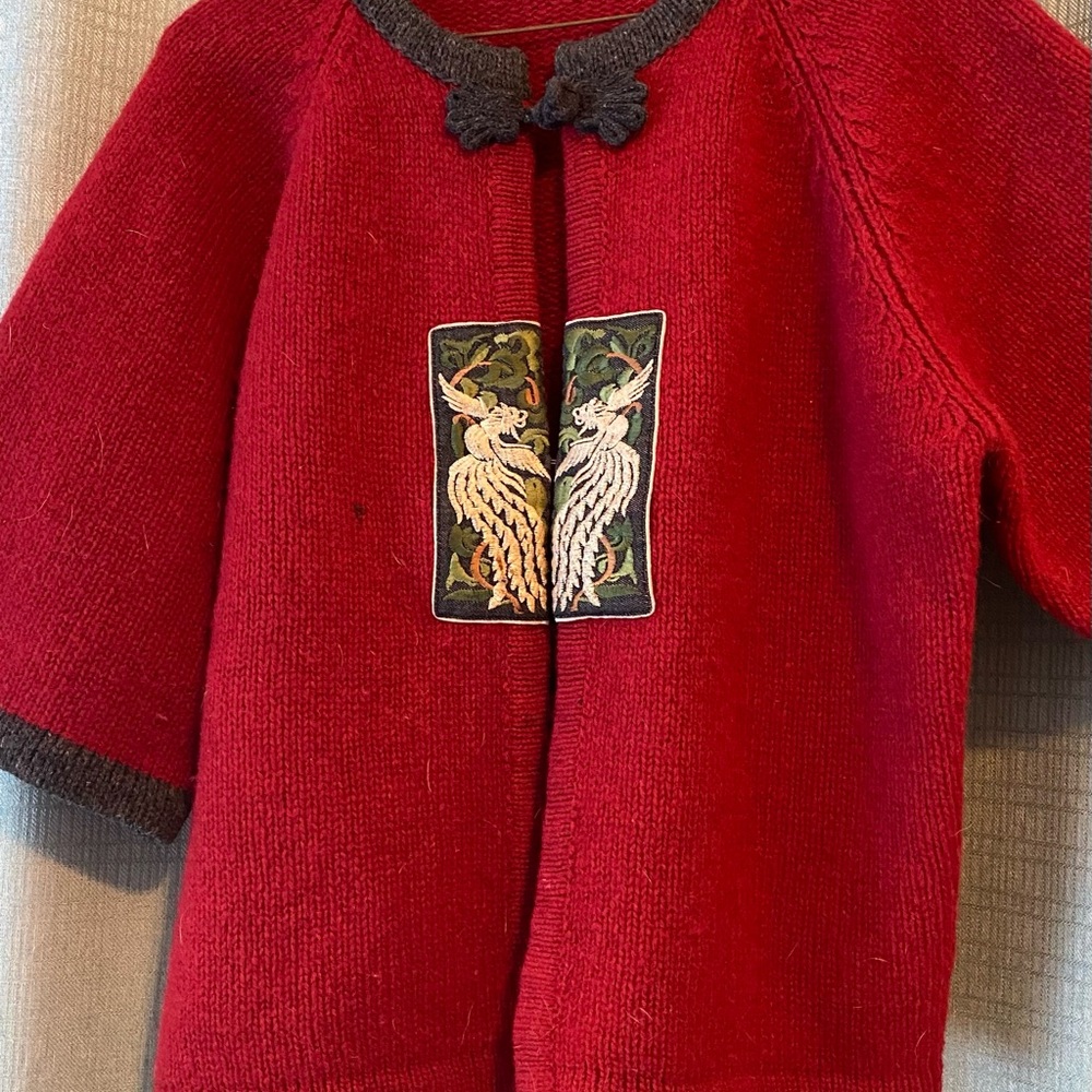 Vibrant Red sweater with Intricate Gold Design